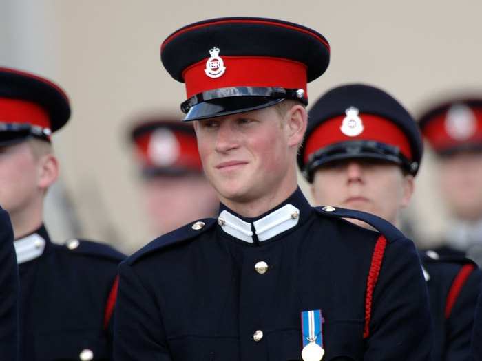 AGE 21: Harry looks on at his passing-out Sovereign