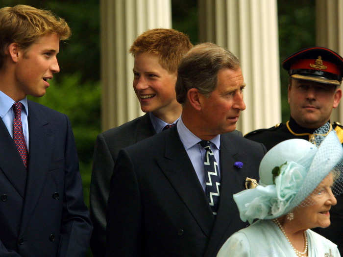 AGE 16. Princes William and Harry share a joke as they celebrate the 101st birthday of the Queen Mother, their great grandmother.