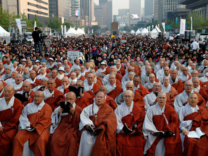 Buddhist monks and nuns attend a prayer service in support of a successful meeting in Seoul, South Korea, April 27, 2018.