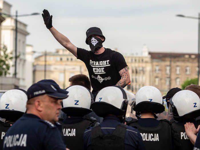 And in Poland, this supporter of the far-right National-Radical Camp (ONR) raised his hand in Warsaw.