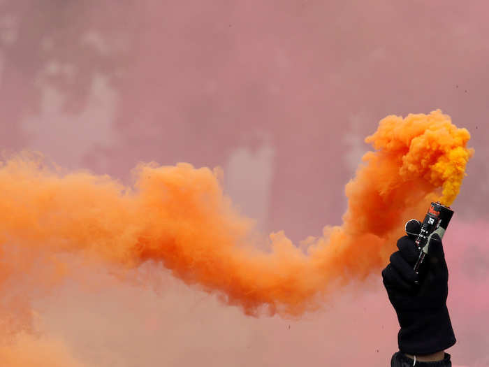 In Paris, union marchers took to the streets to protest President Emmanuel Macron