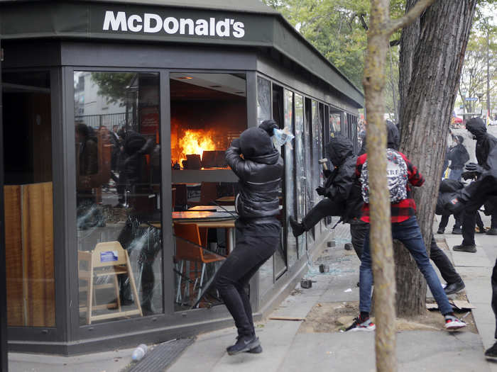 Protesters smashed the windows at a McDonald