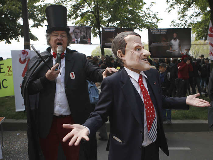 The rally was organized in opposition to Macron