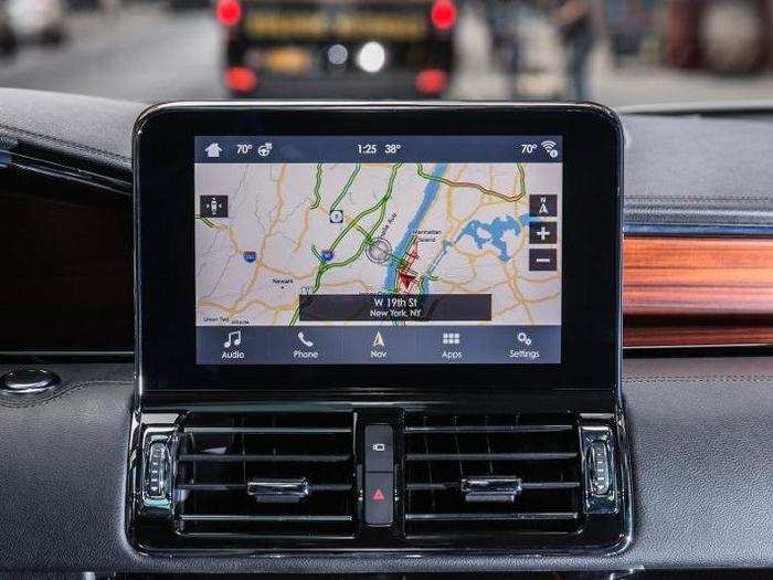 The central infotainment touchscreen runs Ford