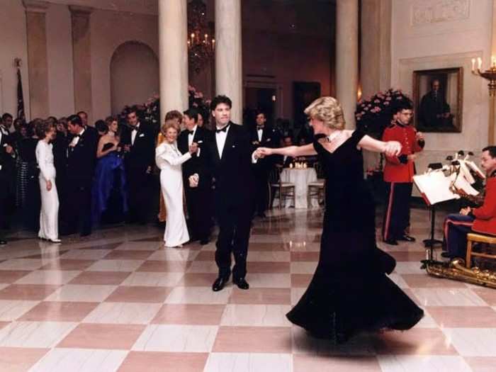 In this iconic photograph, Princess Diana and John Travolta famously took a turn around the dance floor.