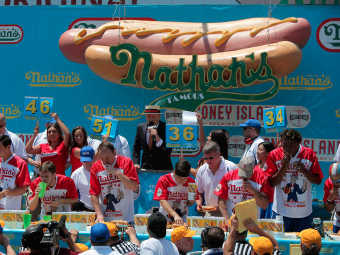 Attend a hot dog-eating contest for the ages