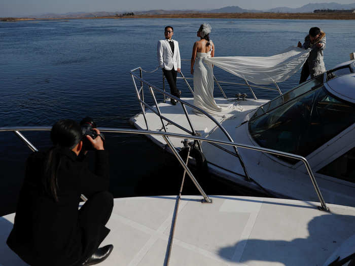 This couple even commissioned a boat to take their wedding photos.