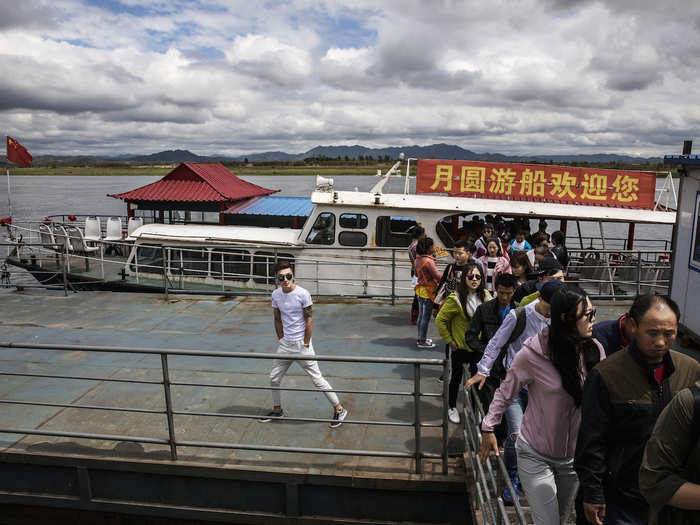 Dandong is also aware of its unique position as a neighbouring city to North Korea, and capitalises on it by operating tours along its side of the Yalu River.