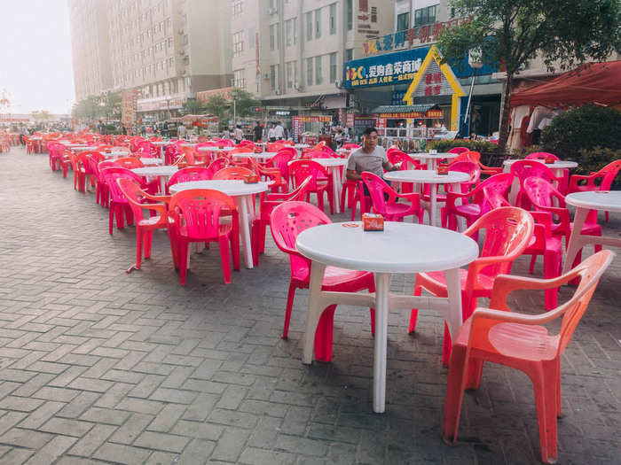 After work, people usually sit at one of the restaurants in the complex to eat dinner and drink beer with friends. At one of these restaurants, we met a group of four Foxconn workers, who invited us to sit with them. We explained that we wanted to understand their lives.