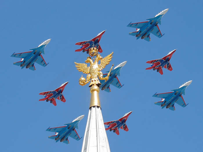 The Russian aerobatic teams made an appearance too. Here are MiG-29 fighters of from Strizhi ("Swifts") in red, and Su-30 fighters from the Russkiye Vityazi (Russian Knights) in blue.