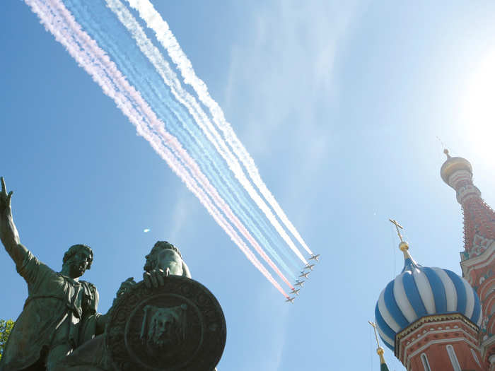 The main Russian Air Force was there too. Here is a fly-past from 6 Su-25 fighters trailing the colors of the Russian flag.