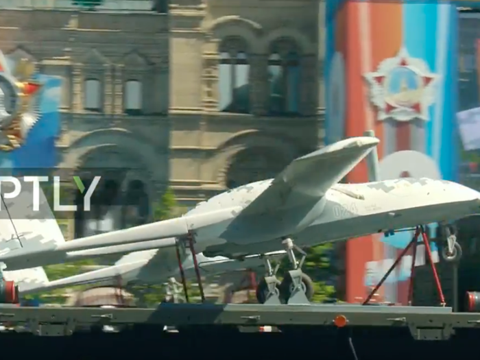 Russia had airborne drones on display too. here is the fixed-wing Korsar, on the back of a truck.