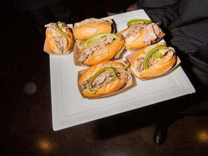 Beef, pepper, and onion mini sandwiches were also passed around the room.