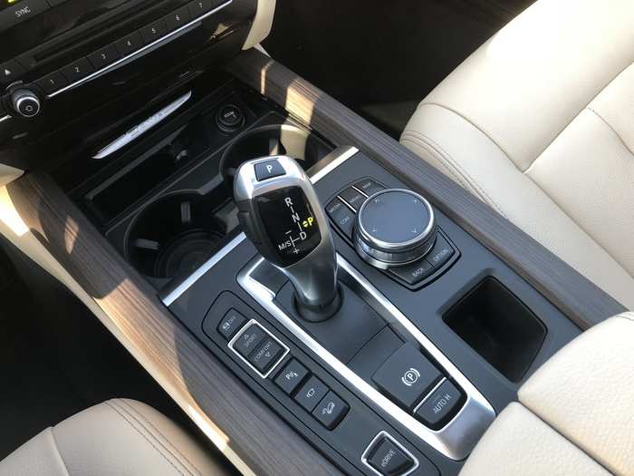 The joystick shifter is, in a word, annoying. But one gets used to it. The transmission can be switched out of automatic into manual, so you can flick gears with the joystick or paddle shifters behind the steering wheel.