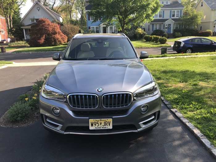 All bimmer from the front: sleek, slightly angry headlights and the signature double-kidney BMW grille.