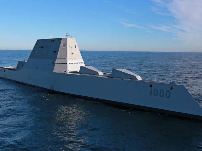 It also has two Advanced Gun Systems — the two compartments in the front — from which it can fire 155 mm long-range projectiles up to 63 nautical miles.