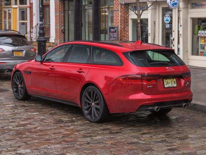 The rear end of the Sportbrake is punctuated by its sloping roofline, wrap-around taillights, and dual exhausts.