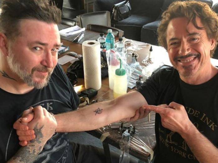 Hemsworth recently got a matching tattoo with his "Avengers" co-stars Robert Downey Jr., Scarlett Johansson, Chris Evans, and Jeremy Renner.