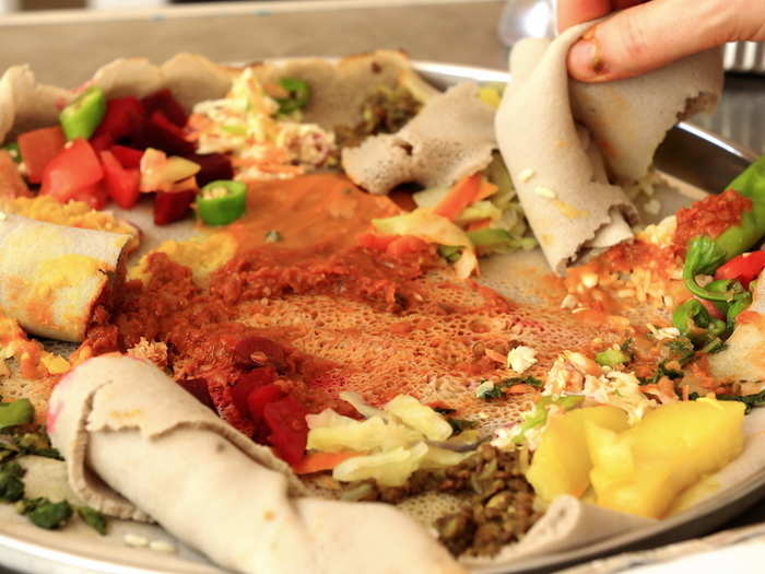 Ethiopians serve their meals atop a tart, fiber-rich bread called injera.