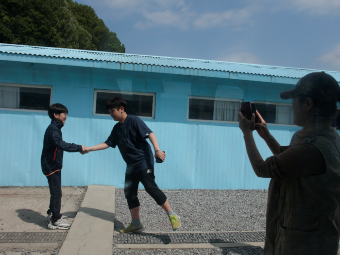 These boys did their best to mimic the historic handshake.