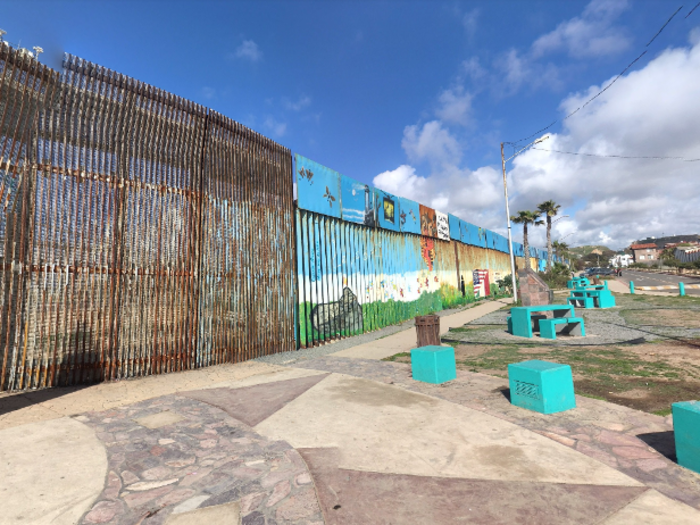 Just a few yards inland from the coast, a large metal door is cut into the fencing that holds a special significance to the American and Mexican families who live near the border.