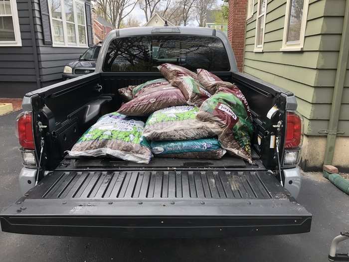 The bed swallowed up enough mulch and soil to repair my yard and garden from a brutal Northeastern winter.