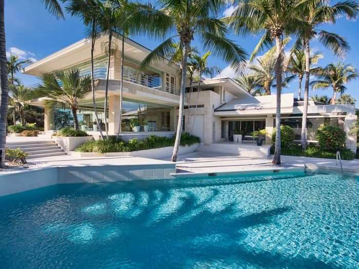 When not running a massive media conglomerate, Malone enjoys the finer things in life, like his Florida beach house.