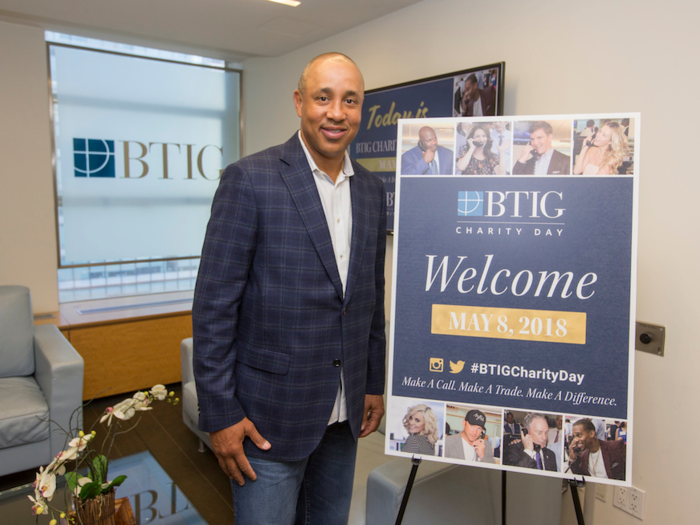 Former New York Knicks player John Starks posed to promote BTIG