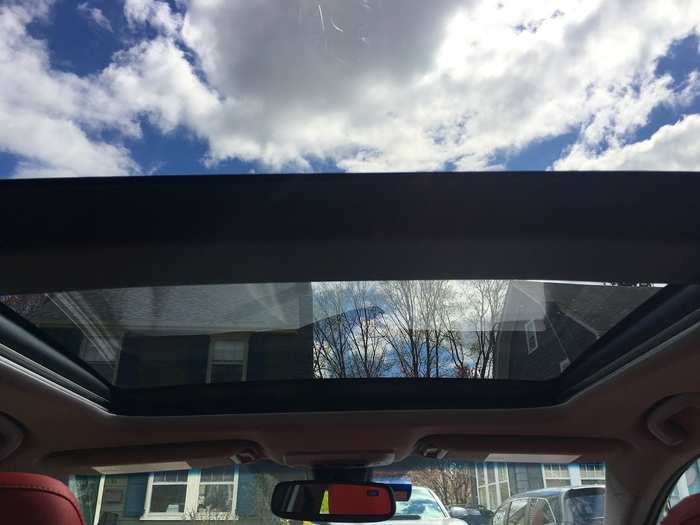While a power-operated panoramic roof floods the cabin with sunshine.