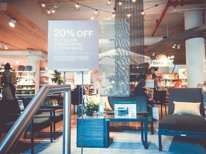 Immediately in the entryway was a sign advertising 20% off outdoor dish sets.