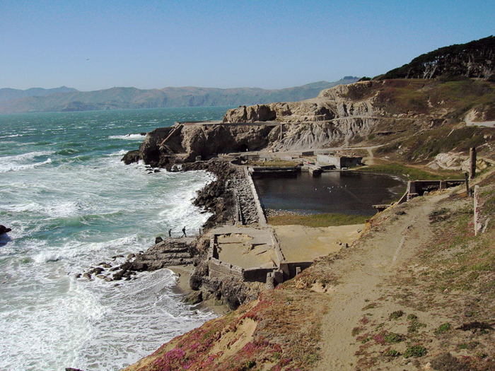 But the Sutro Baths struggled financially. Plans were made in 1964 to replace the Baths with high-rise condos when the facility was suddenly burned down in an arson. All that remain are a few concrete walls and staircases.