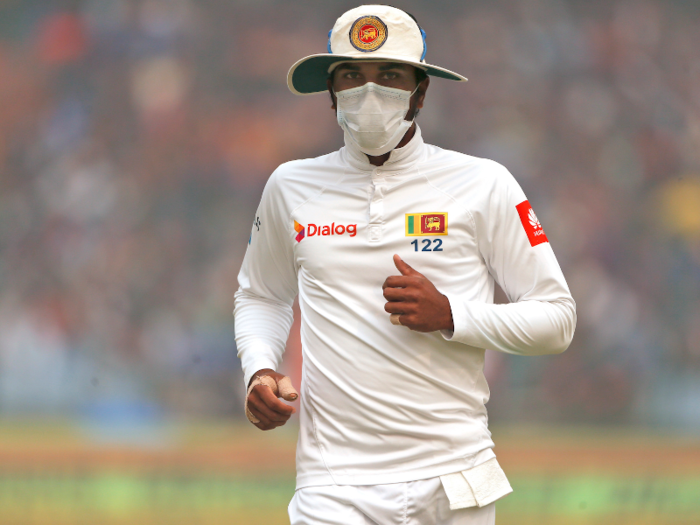 Athletes like this visiting cricket player from Sri Lanka take precautions when they play in India. In 2017, two cricketers threw up on the field when Sri Lanka and India played a test match.