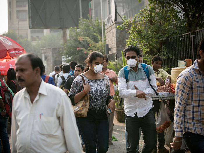 In many cities, locals have resorted to wearing surgical masks outside.