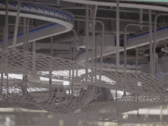 When you look up, you see tons of bags traveling along these conveyor belts along the ceiling. It