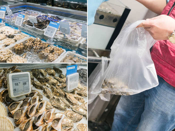 There are rows and rows of fresh, live oysters, scallops, shrimp, prawns, lobsters, and fish. While Chinese tend to like picking their own seafood, I opted to have a Hema employee help me select a mix of clams and scallops.