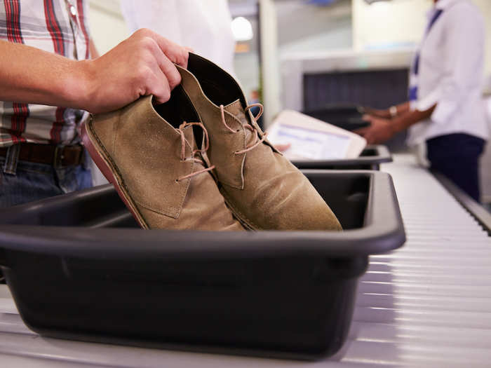 5. Walk barefoot through airport security