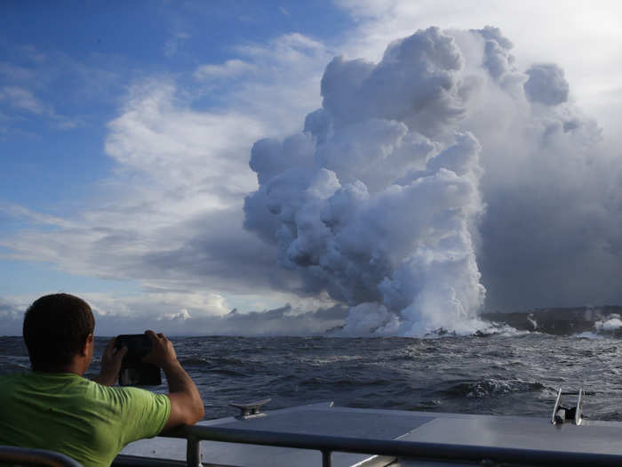 Faced with the volcanic heat, sea water gets boiled. That creates a mix of hydrochloric acid, steam, and tiny glass particles, which can cause respiratory issues.