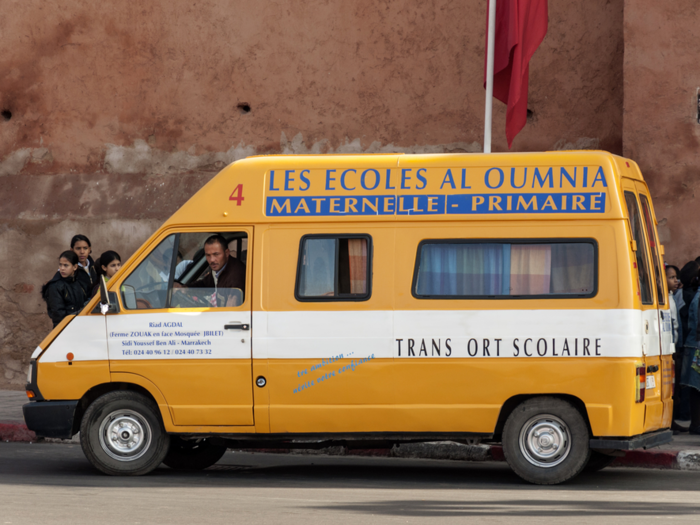 Students at this primary school in Marrakesh, Morocco, take a yellow van to school. Most public schools in Marrakesh don