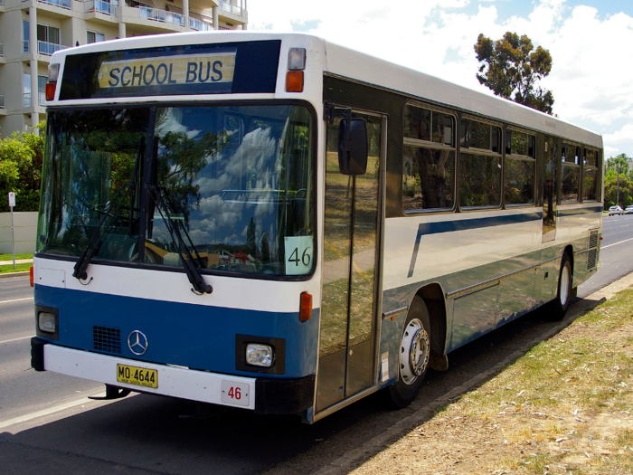 Not all school buses are yellow. This Mercedes-Benz school bus from Germany resembles a charter bus you