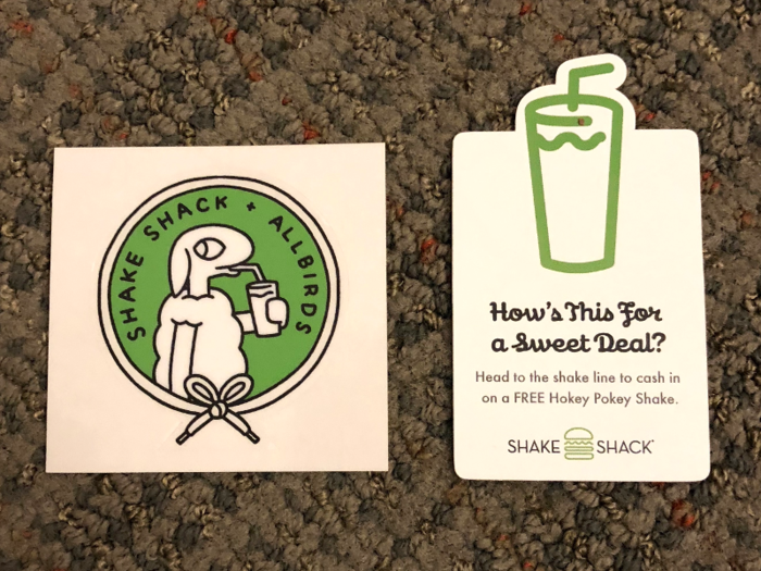 The box also comes with a cute Shake Shack-Allbirds sticker, and a free ticket to get a Hokey Pokey Shake. But since that would