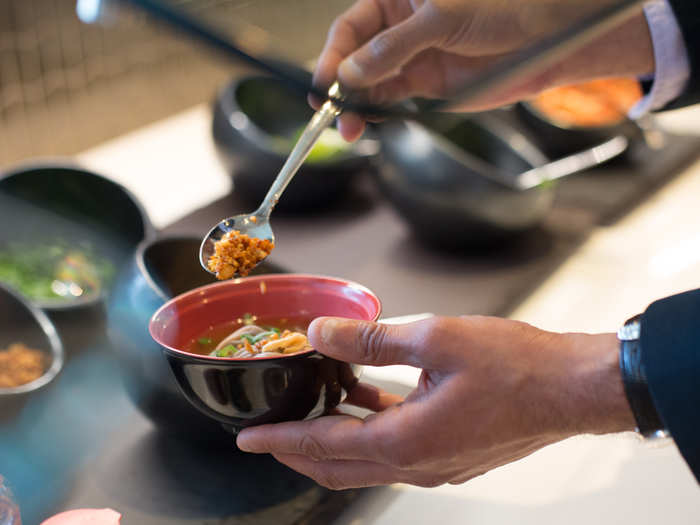 A ramen noodle bar, available in the afternoon, has all the fixings.