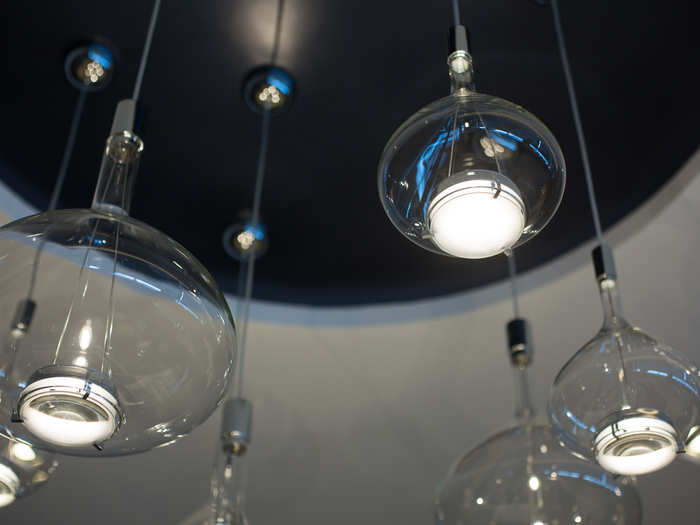 Glass baubles hang like rain drops from the chandeliers.