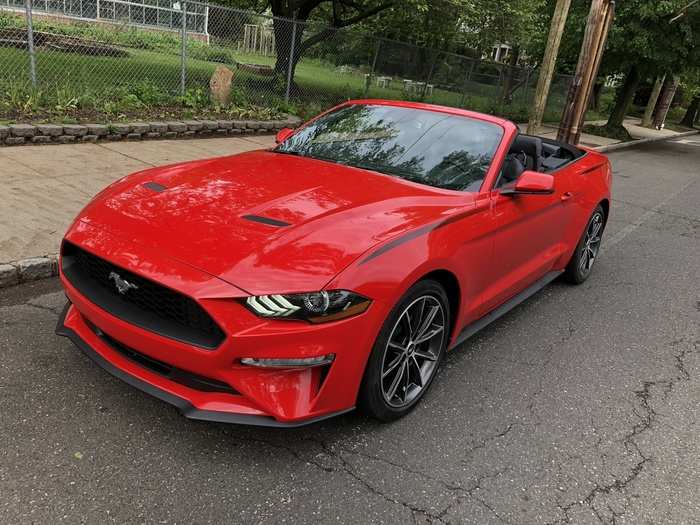 The car looks especially cool with the top down.