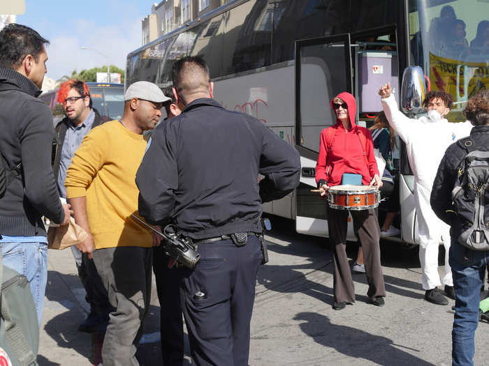 Police officers eventually told the man to stay inside the bus while the protest continued.