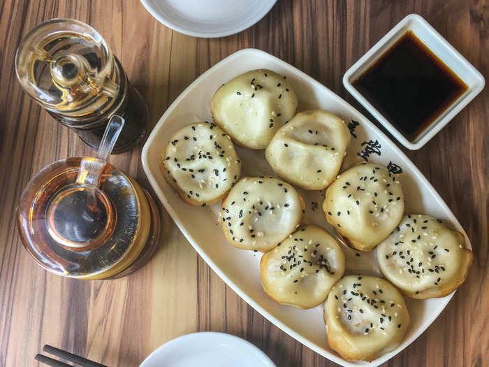 One dish I missed in Shanghai was sheng jian bao, small pan-fried buns. They are filled with pork and a gelatin that turns to soup when heated. They have a thicker skin than soup dumplings and crispy on the bottom. I found them at a restaurant in Zhengzhou.