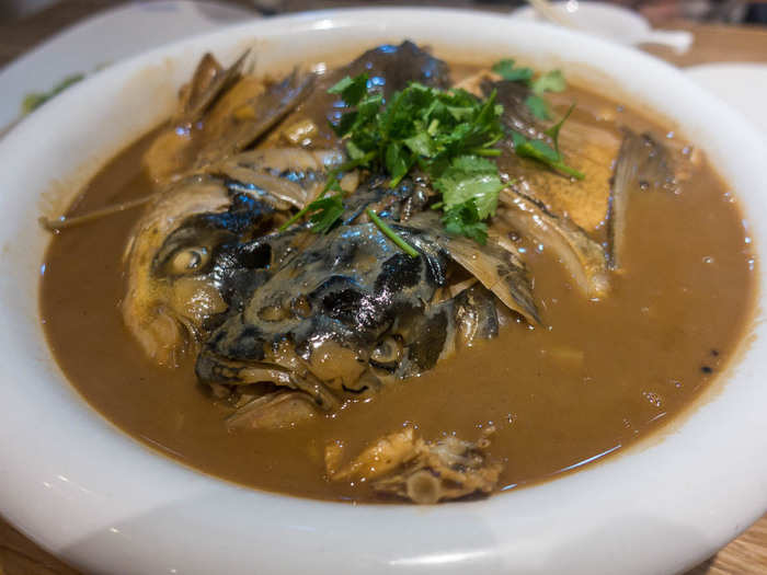 One of the top dishes in Dongbei cuisine, or food from northeastern China, is yutou paobing (fish head stew). It is cooked in a brown, savory, sweet gravy and served with thin, crispy pancakes. Dongbei cuisine takes influences from Manchuria, as well as nearby Beijing and Shandong province.