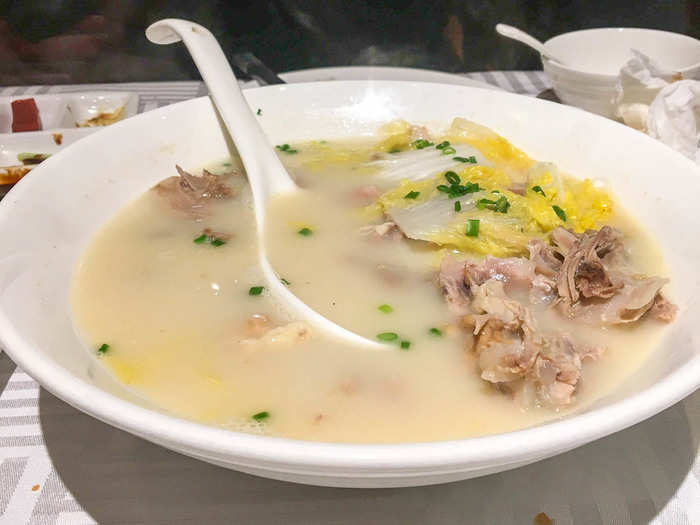 After the main duck course, a soup made from the duck bones is served with vermicelli noodles and cabbage. It