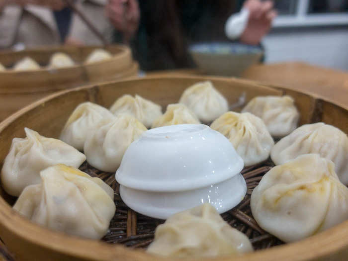 The dish is traditionally served with slices of ginger and black Zhenjiang vinegar.