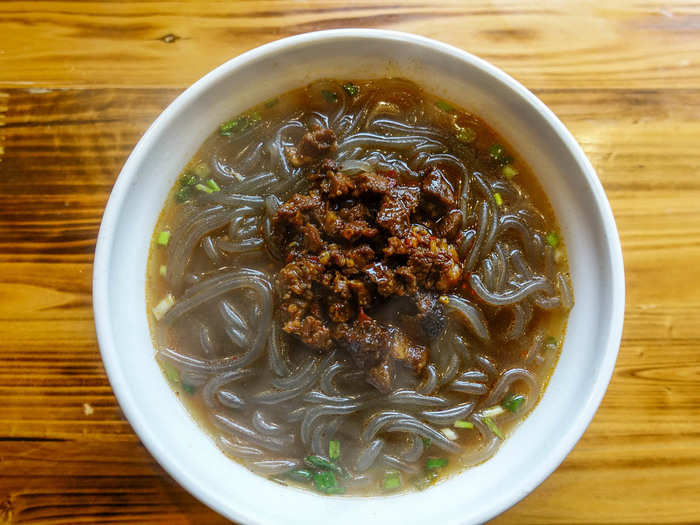 On my last morning in Wulingyuan, I had a Hunanese version of hot and sour sweet potato noodles with ground pork. The clear noodles were springy and chewy, with a totally different texture than most noodles I