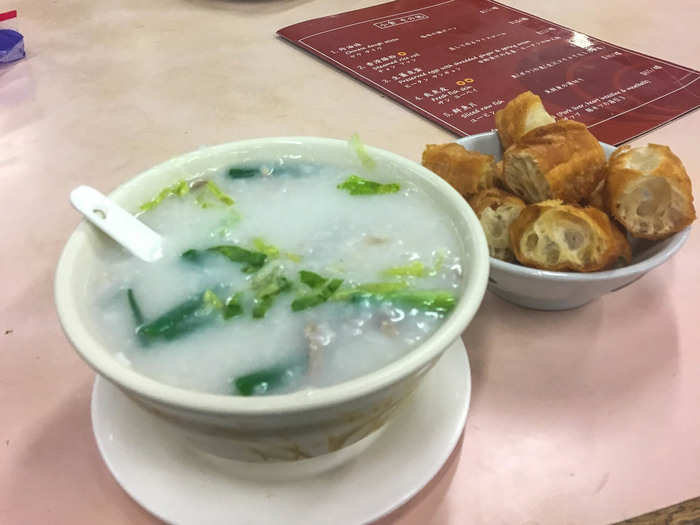 When I returned to Hong Kong, I headed for a traditional Cantonese breakfast of congee with shredded salt pork and "century egg," or egg preserved in clay and quicklime. The strong, salty, pungent egg is perfect with the bland congee. The dish is often served with fried dough sticks for dipping. It